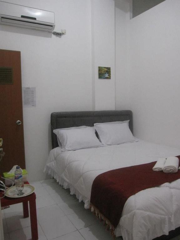 Capsule Homestay Сурабая Номер фото